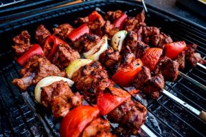 Turkish lamb shish kebab on the barbecue, from side