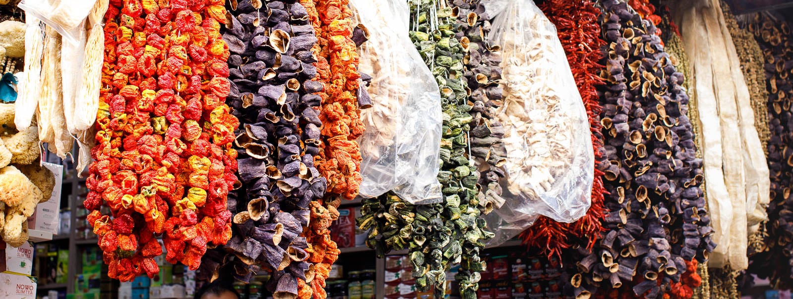 Dried vegetables hanging for sale at spice market