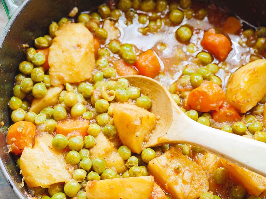Up-close image of Greek peas & potato stew